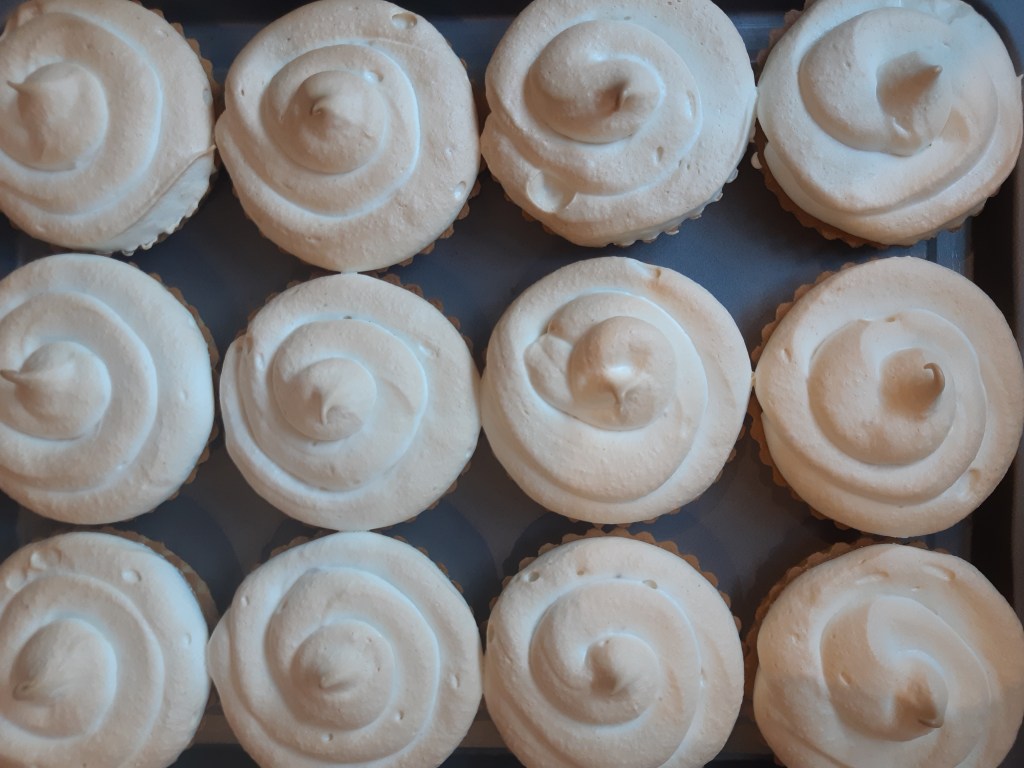 Lemon and lime meringue tarts