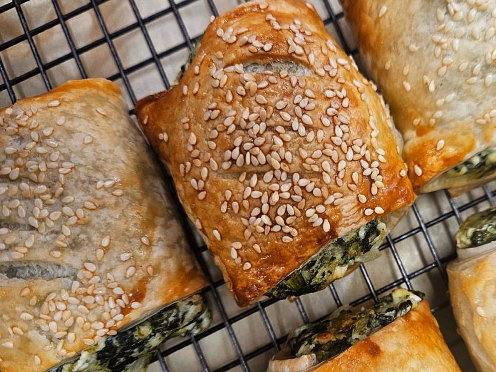 An image showing super green spinach and feta rolls